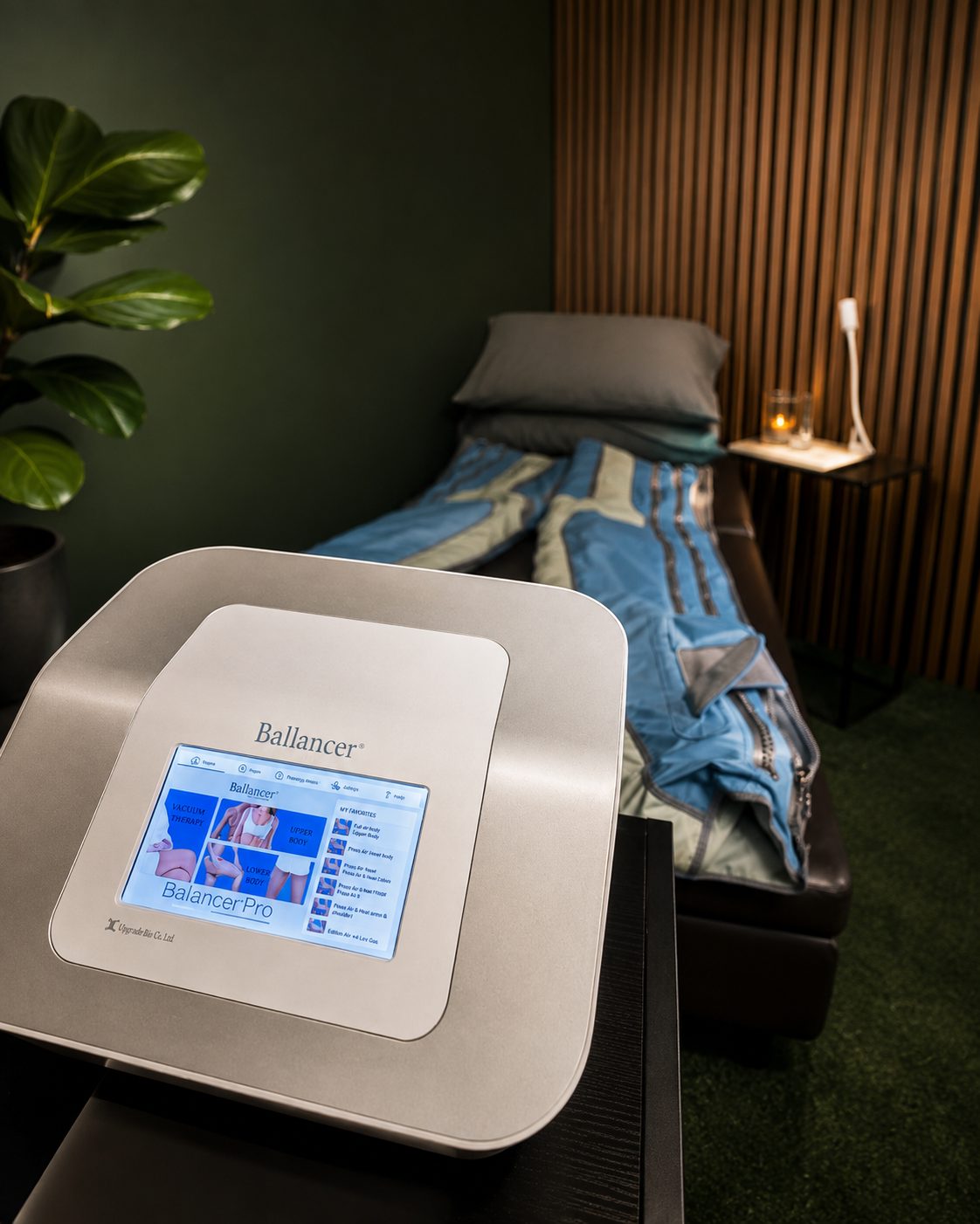The Ballancer Pro suit laid out on the treatment lounger at Vytara, with the control console in the foreground